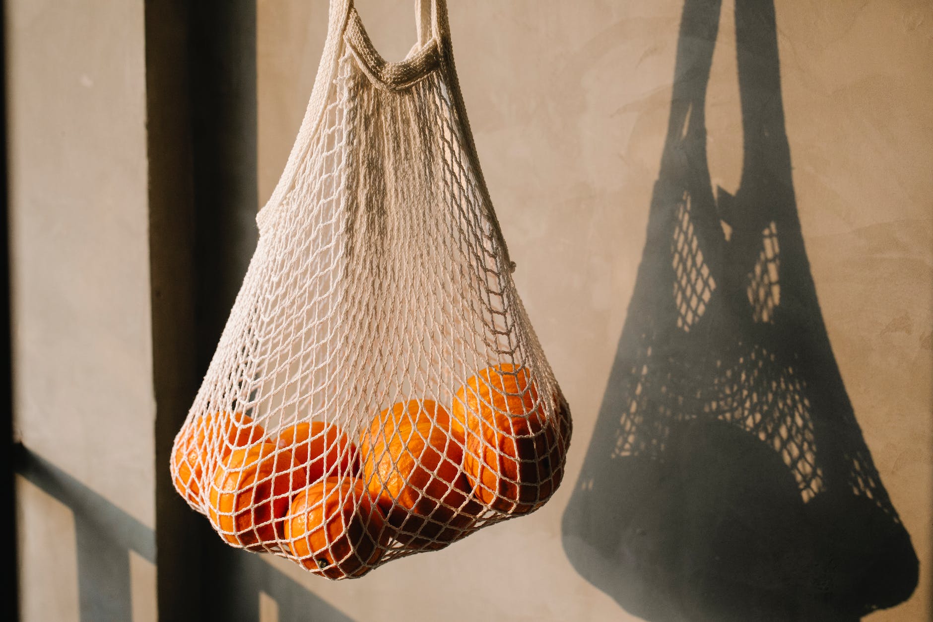 bag of oranges near wall