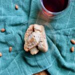 Vegan almond biscotti with a cup of tea.