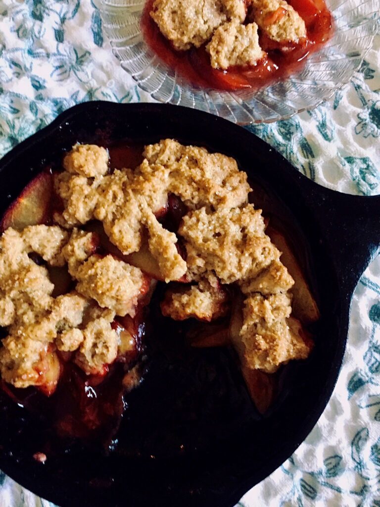 small batch maple plum cobbler baked in a cast iron skillet, recipe from digestiblesustainability.com