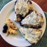 Plate of ginger blackberry scones, a vegan and nut-free recipe from digestiblesustainability.com.