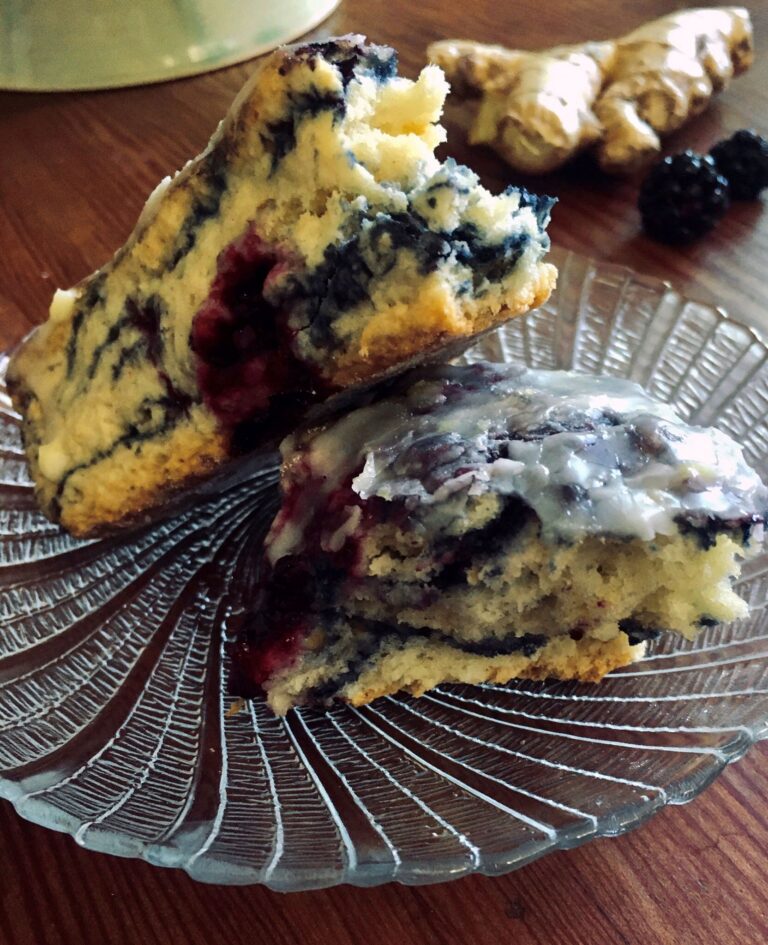 ginger and blackberry scones cut in half.