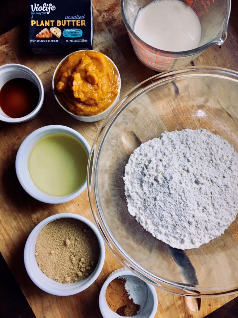 Ingredients you need to make vegan pumpkin streusel muffins.