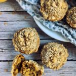 Vegan pumpkin muffins with a streusel topping.