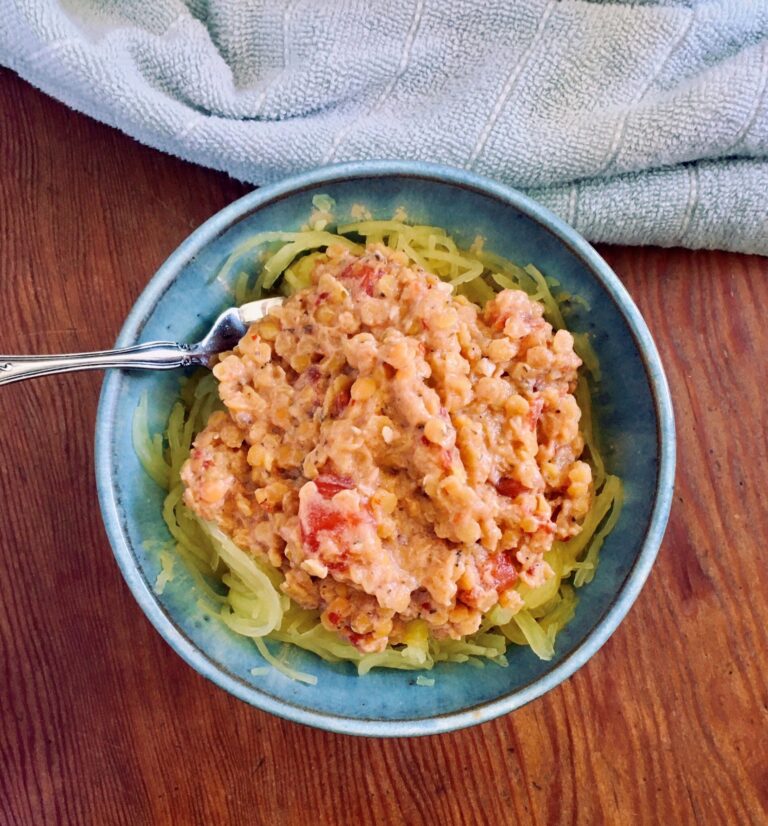 easy vegan Creamy Lentil Arrabbiata Spaghetti Squash recipe, dished in a small bowl.